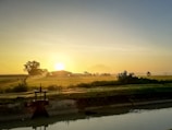 Sunrise over the irrigation canals at Pampa Colorada, highlighting sustainable water management.