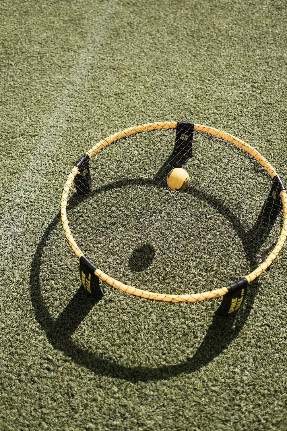 white and black round rope on gray textile