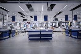 A team of professionals collaborating in a warehouse environment.