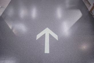 Close-up image of a commercial VCT floor with a fresh, polished surface reflecting overhead lights.