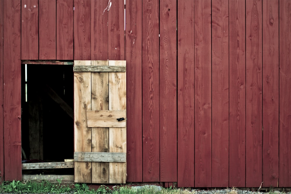 red wooden wall during daytime