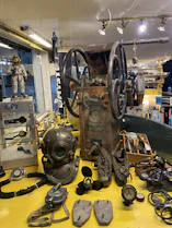 A marine equipment display featuring navigation tools and safety gear arranged neatly.