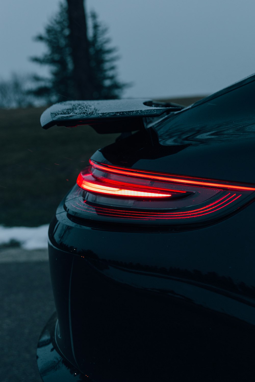 black car with red and black tail light