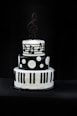 white and black ceramic container