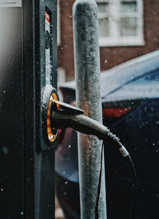 black coated wire on black car