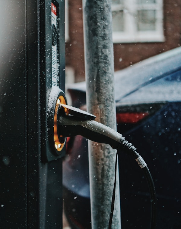 black coated wire on black car