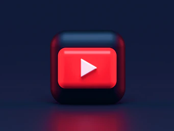 A 3D red play button icon on a dark blue background