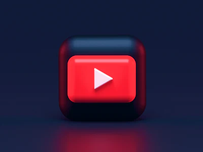 Glowing video play icon on a dark background