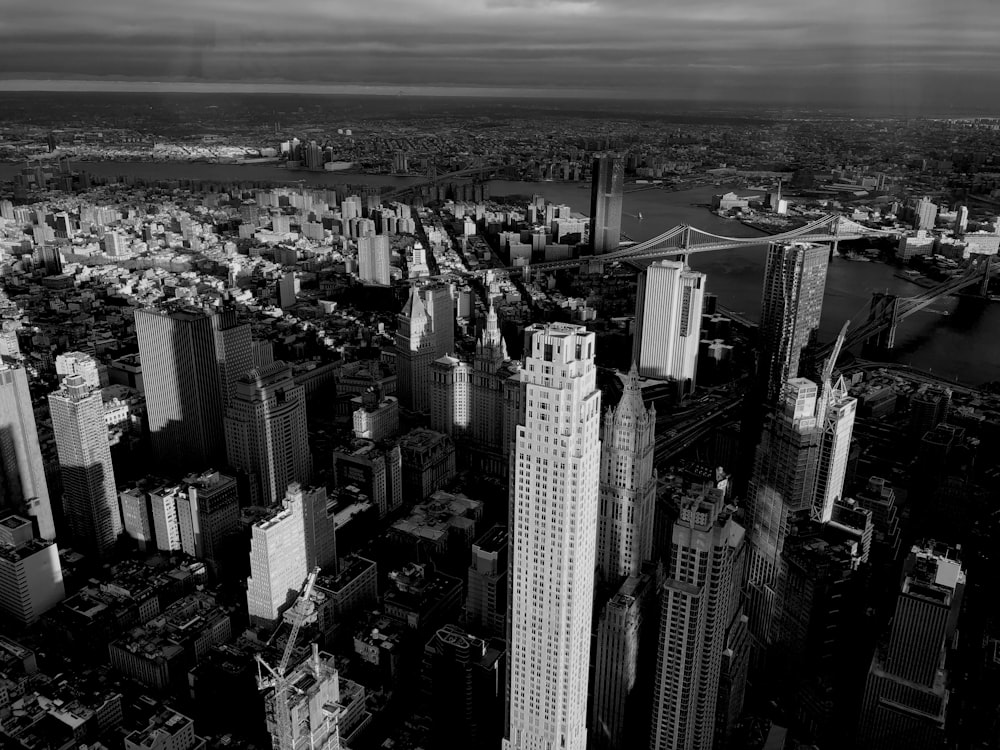 grayscale photo of city buildings