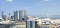 A panoramic view of Ajman Free Zone with digital overlays representing cloud technology.