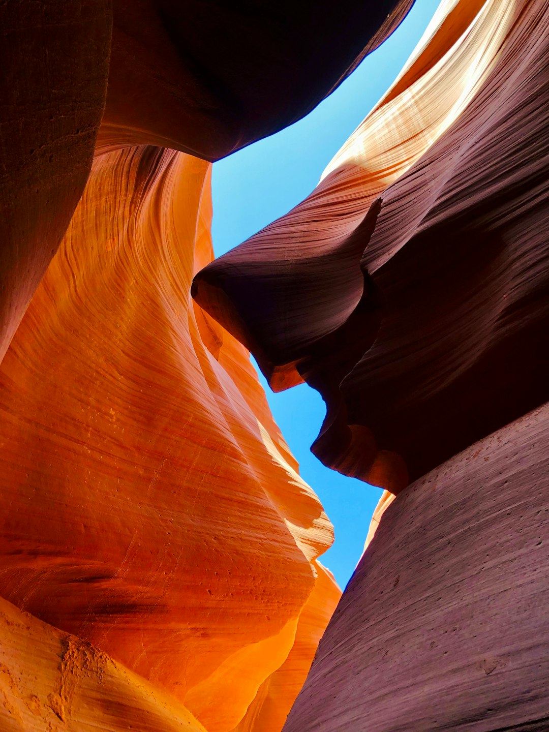 brown rock formation under blue sky during daytime