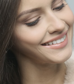 woman in white fur coat