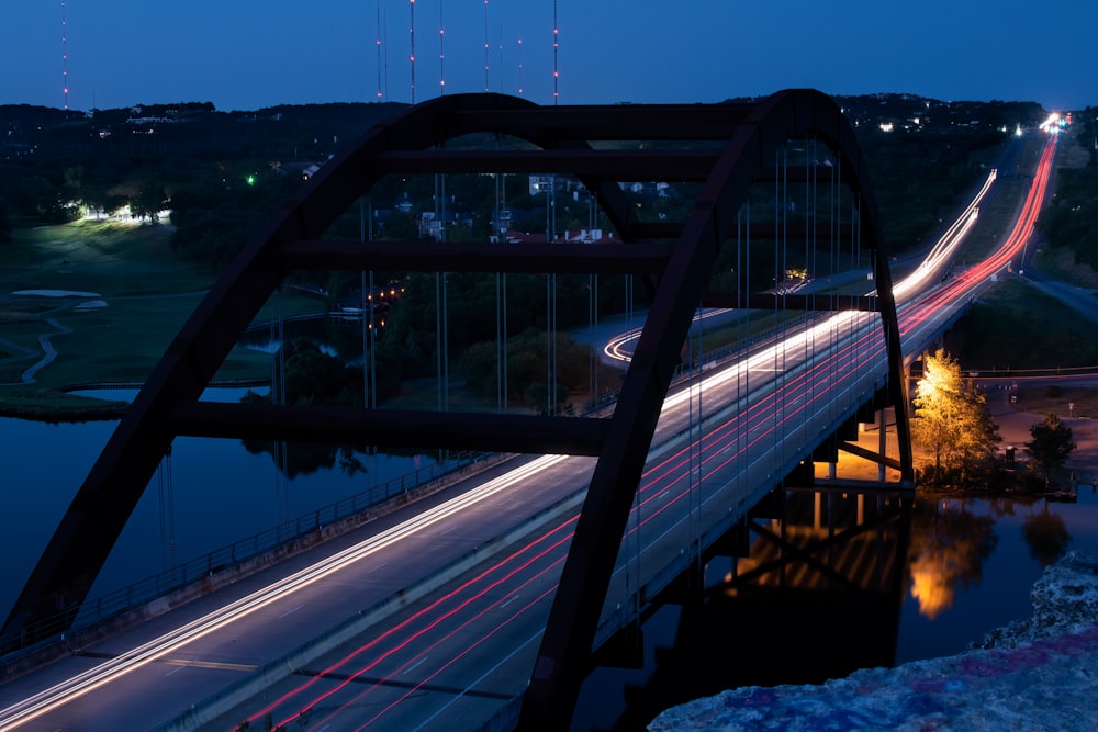 gray metal bridge over river during daytime