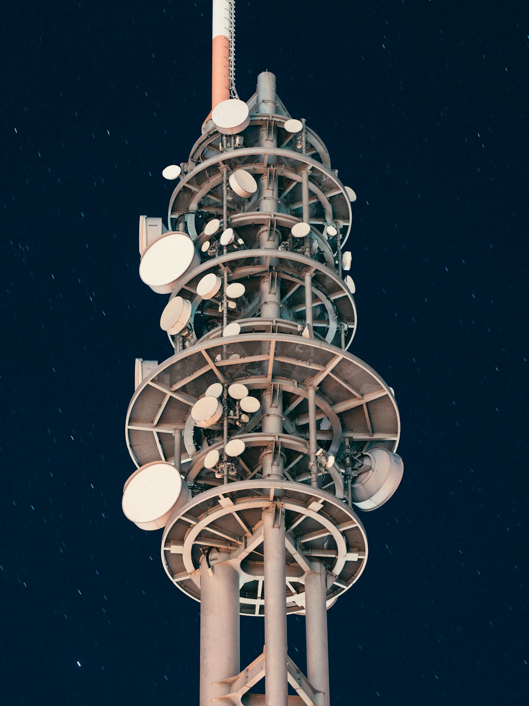 white and black tower during night time