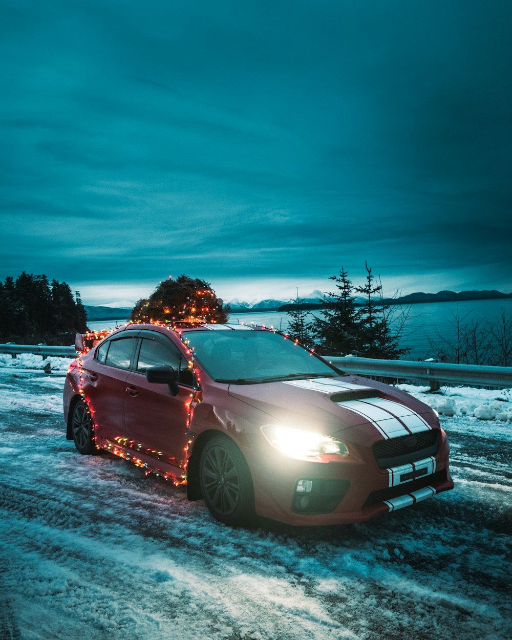 red bmw m 3 on snow covered ground during daytime