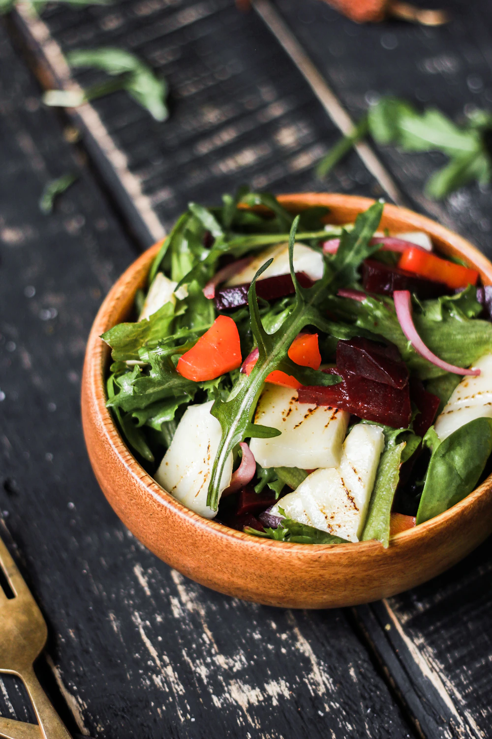 Colourful salad with beetroot, cucumber, greens, and cheese, ready to scan in Daystrong