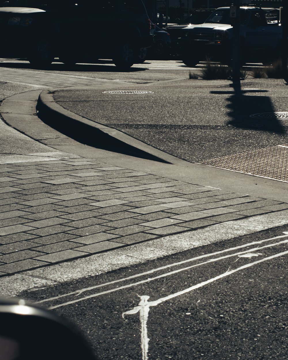 grayscale photo of road with no cars