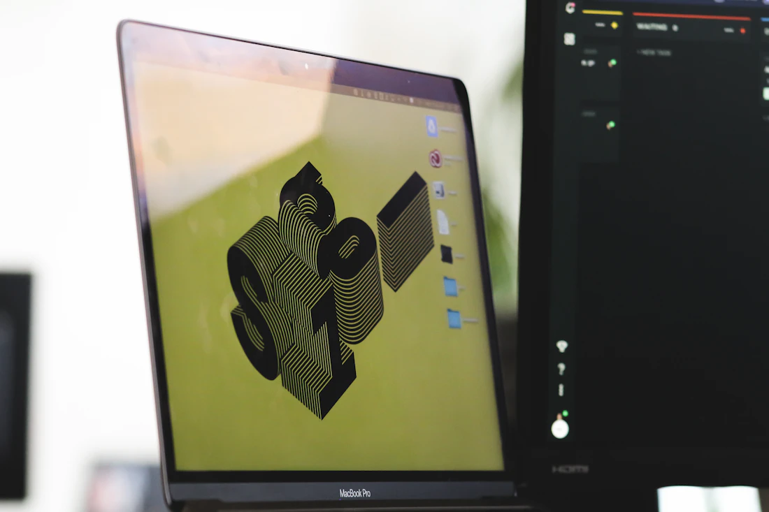 Designer reviewing a 3D CAD model on a large monitor