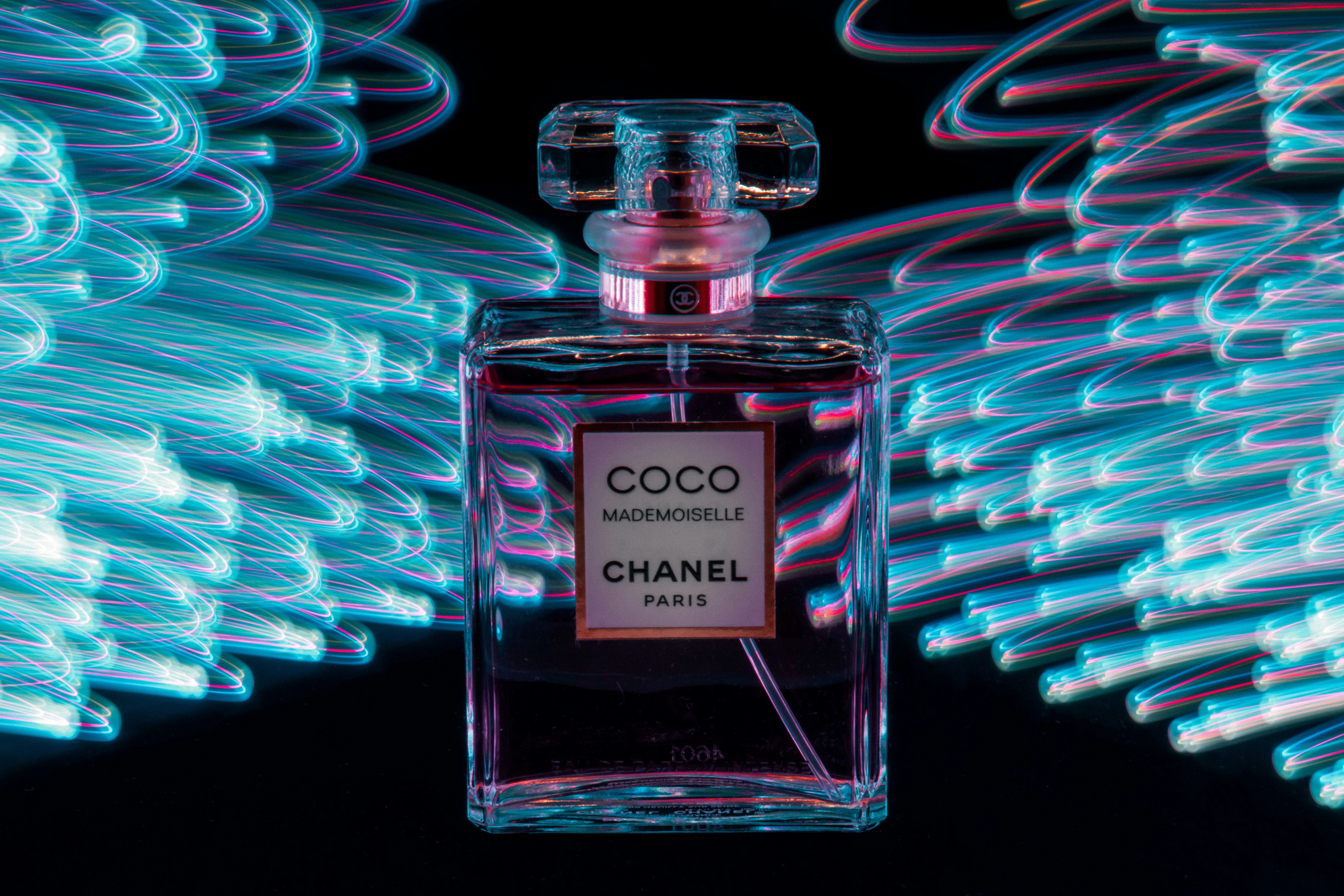 Blue and pink color on coco chanel perfume bottle - - - Hey, if you like my photos and want to see more, visit my webpage myrtorp.com - Paypal Support: paypal.me/pmyrtorp - follow me on Instagram: @myrstump - Contact me at Philip@myrtorp.net