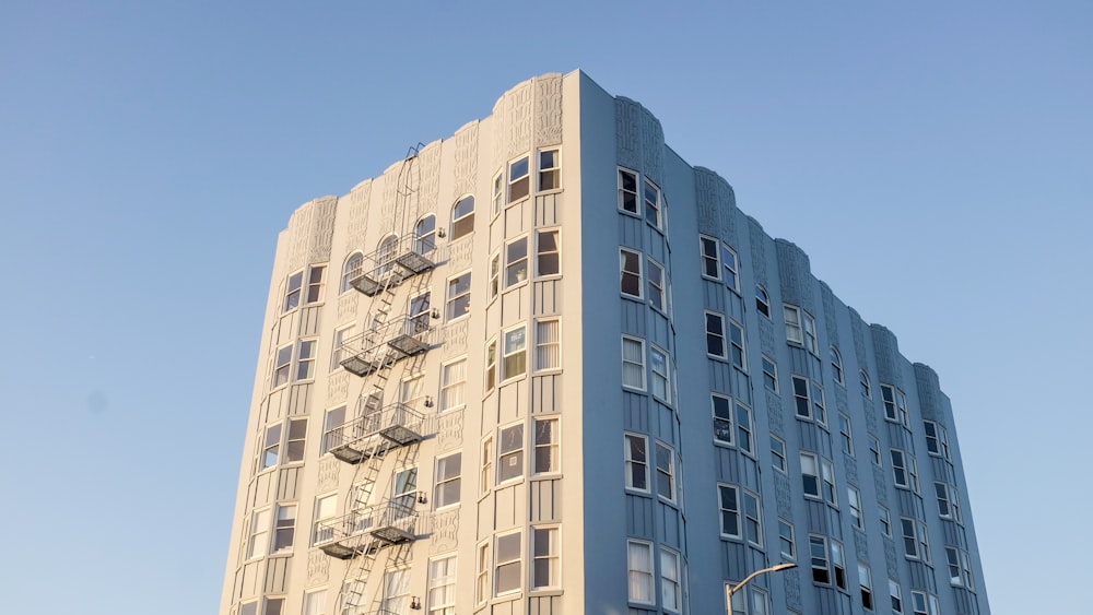 beige concrete building under blue sky during daytime