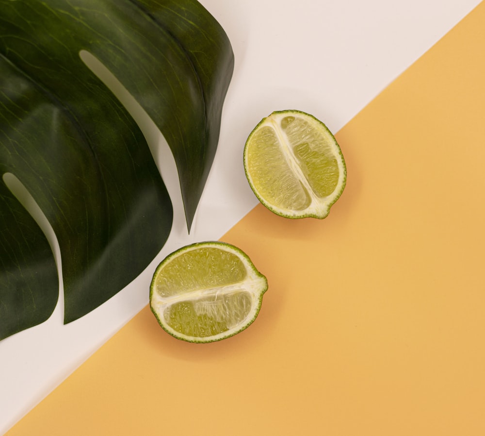 sliced lemon on yellow table