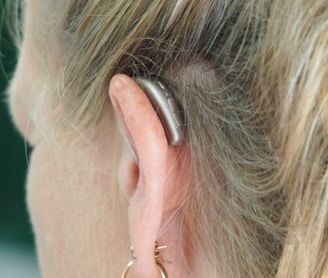 woman wearing silver hoop earrings