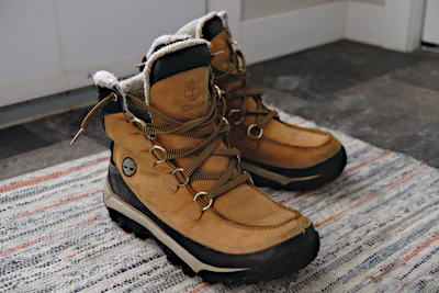 brown and black high top sneakers
