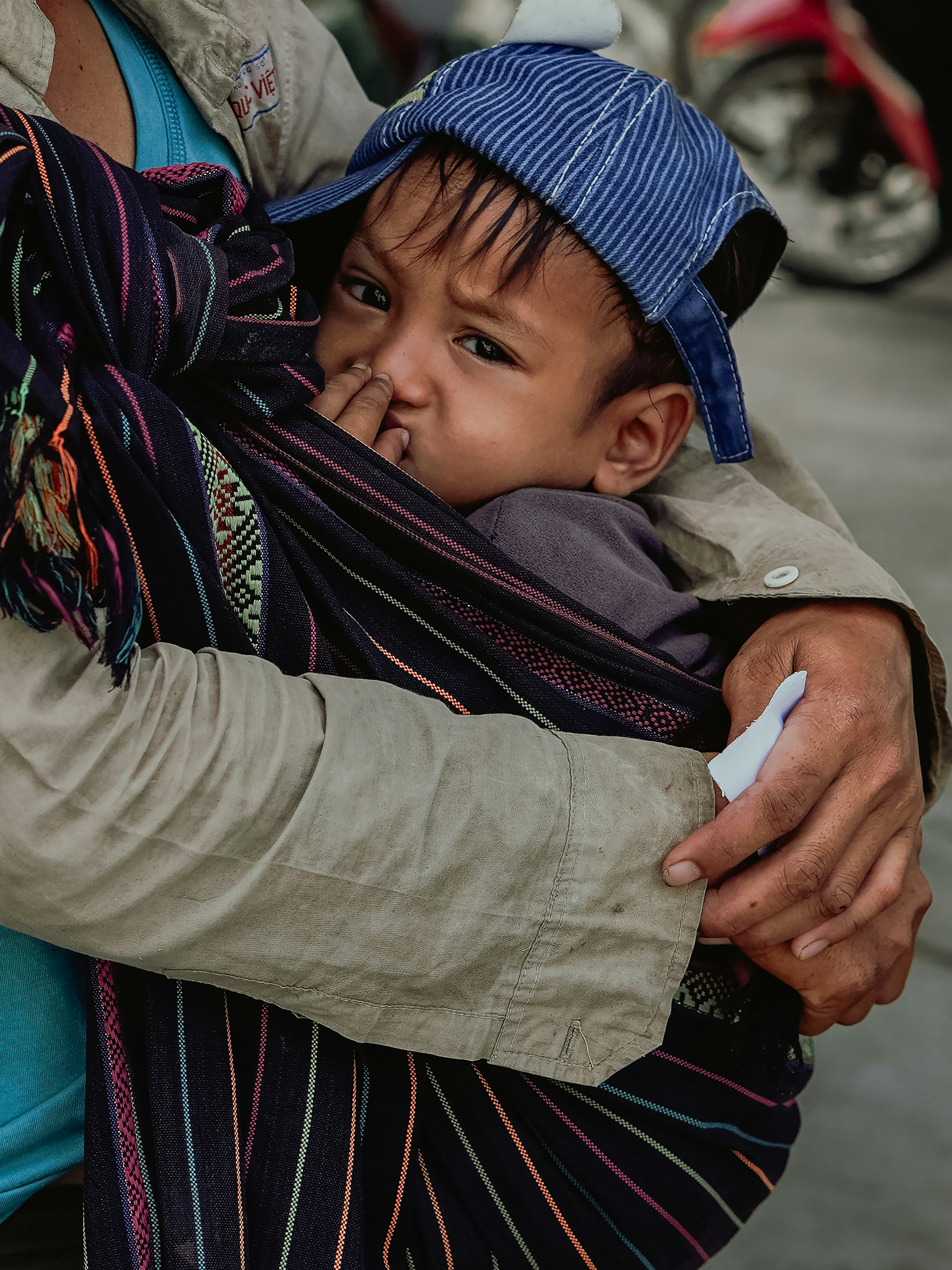 woman in blue knit cap and gray long sleeve shirt