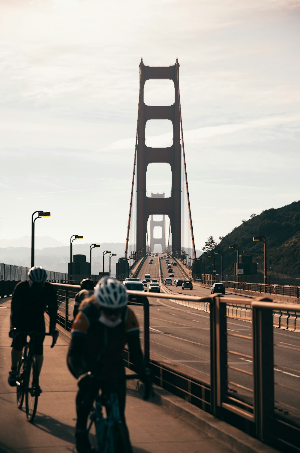 people walking on bridge during daytime