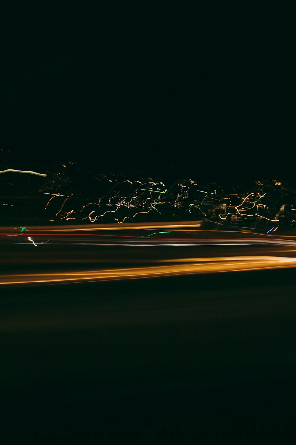 time lapse photography of cars on road during night time