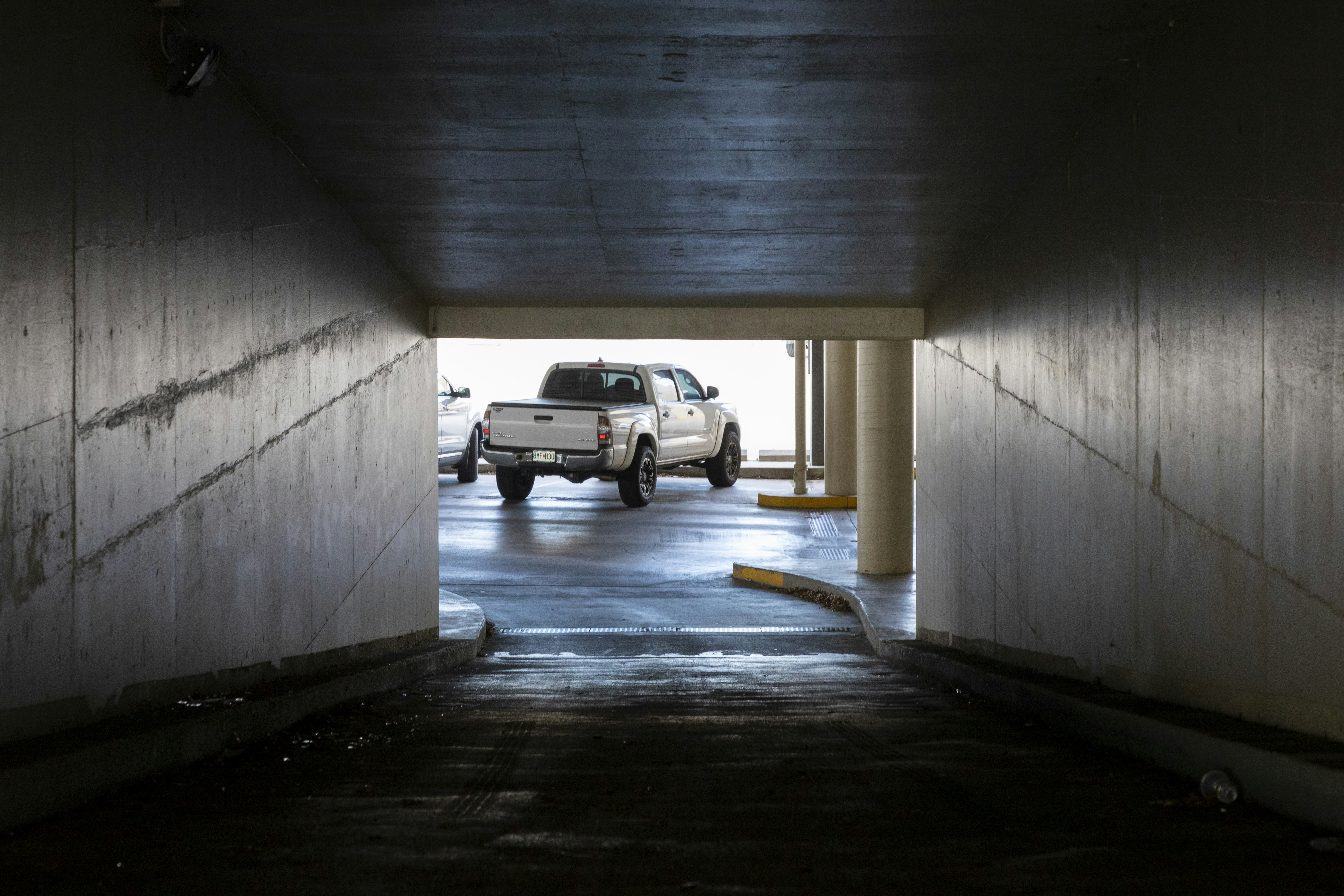 white suv parked in garage