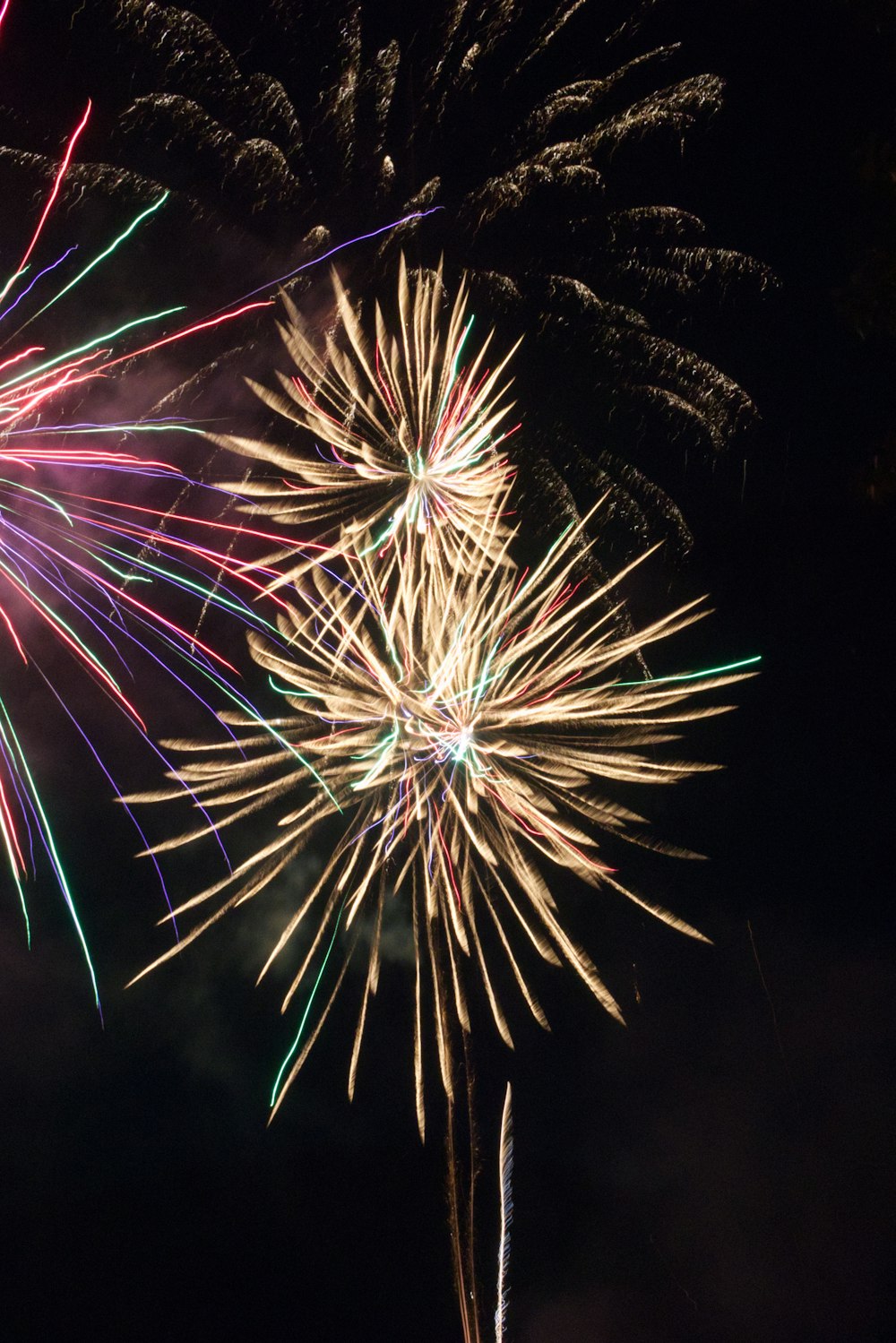 white and red fireworks during nighttime