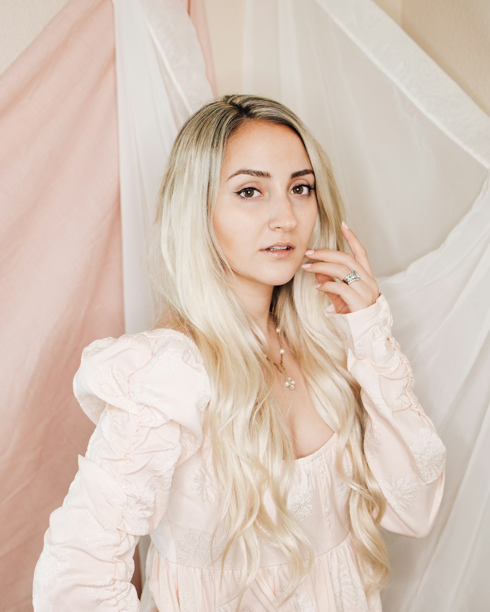 woman in white long sleeve shirt