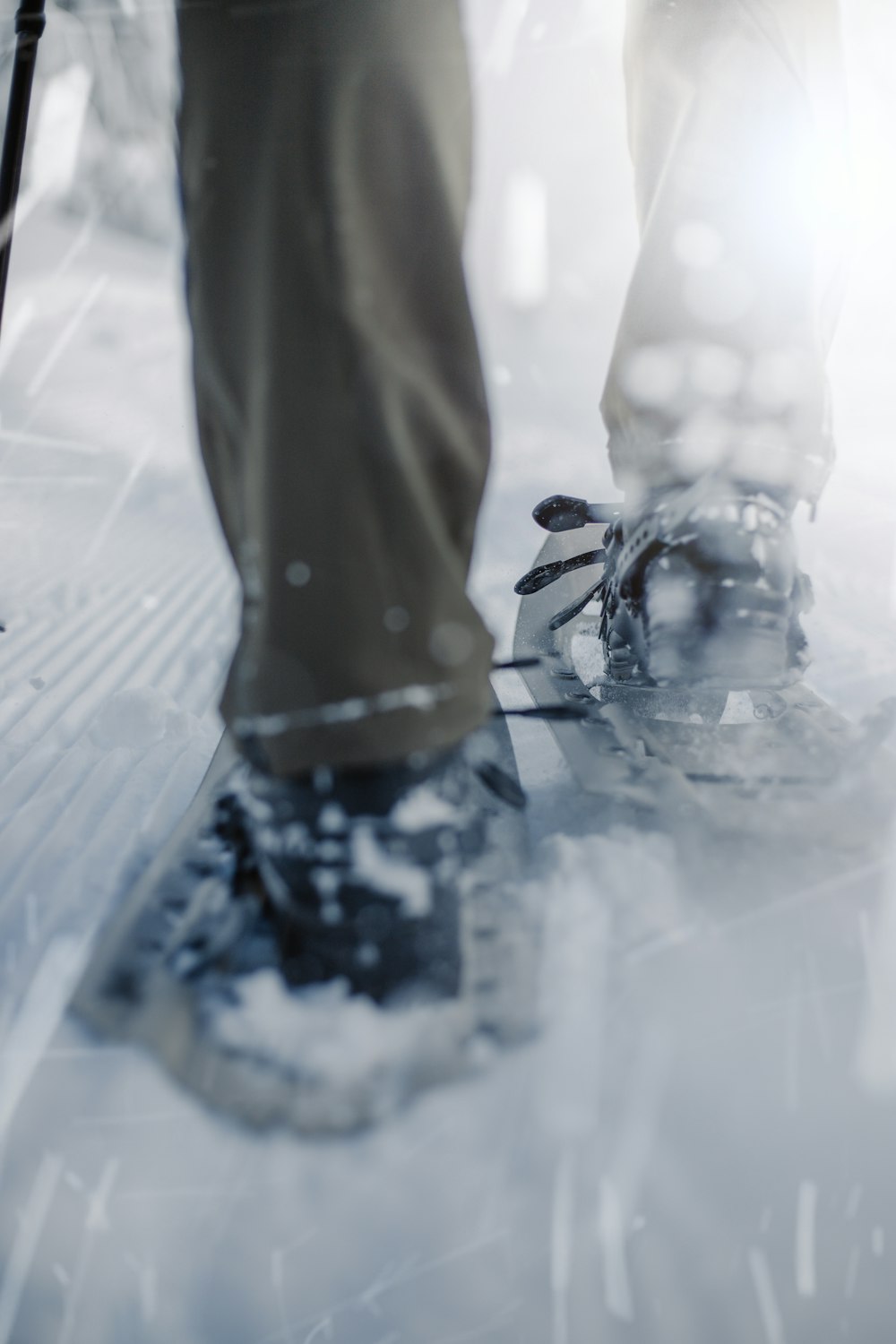 a person standing on a snow covered ground