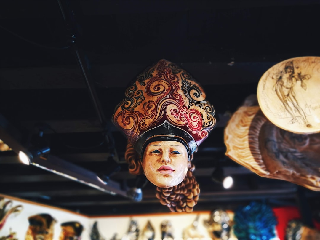 woman in gold and red headdress