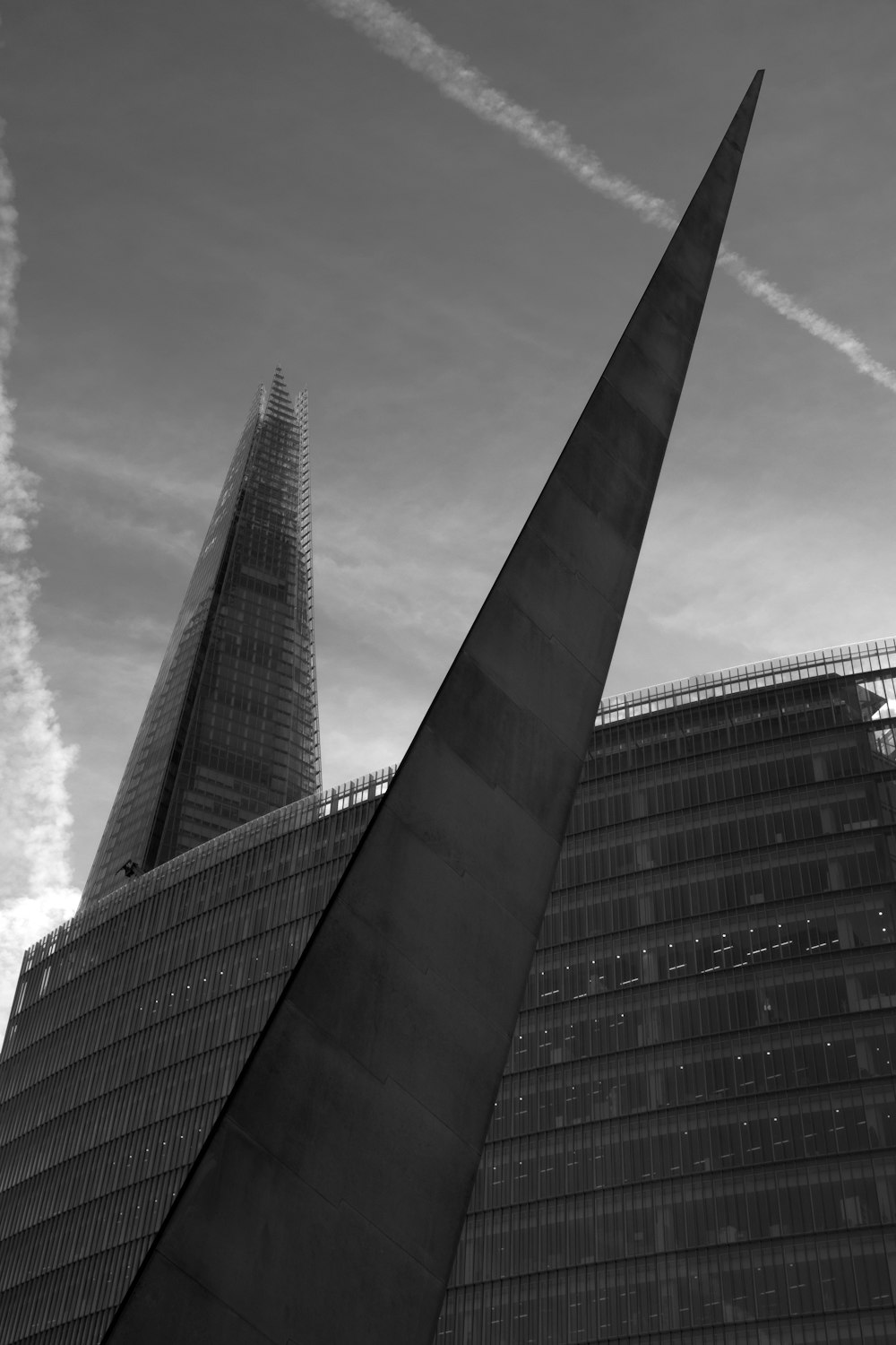 grayscale photo of high rise building