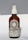 A brown glass bottle with a white spray nozzle containing a product labeled 'Allbody' for face, body, and hair. The label mentions ingredients such as organic cold-pressed sweet almond, jojoba, grapeseed, avocado, olive oil, and vitamin E. The bottle casts a soft shadow against a light background.