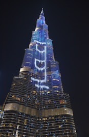 lighted high rise building during night time