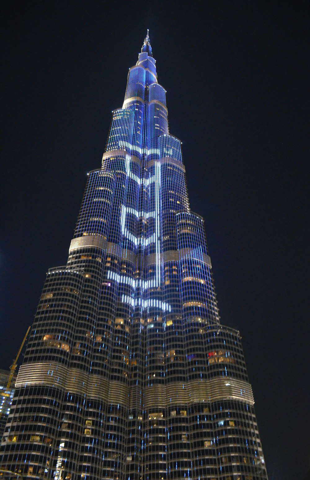 lighted high rise building during night time