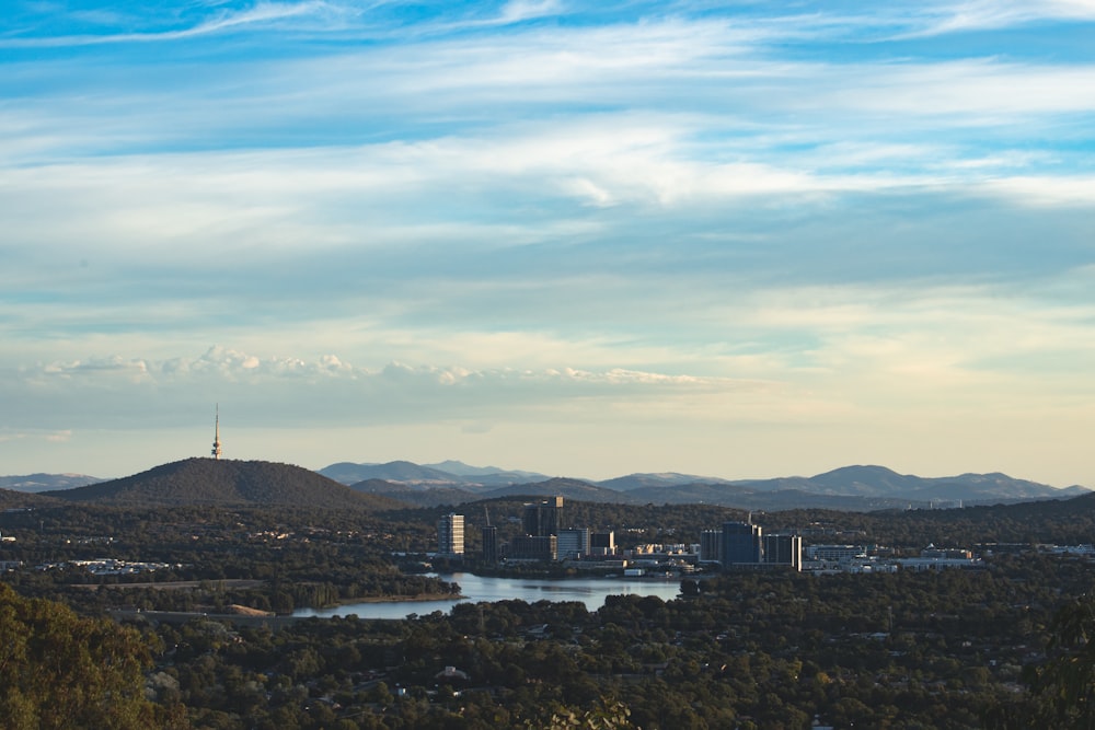 city skyline under blue sky during daytime