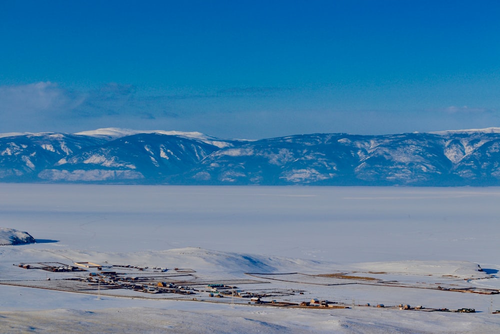 snow covered mountain under blue sky during daytime