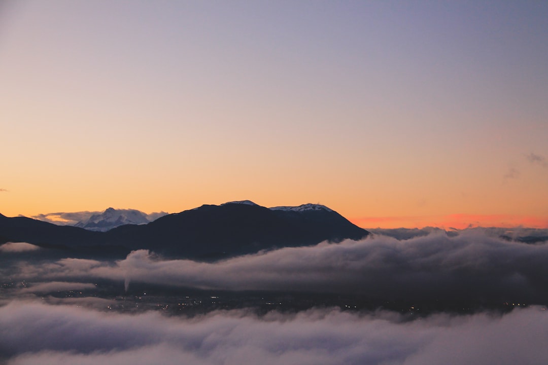 silhouette of mountains during sunset