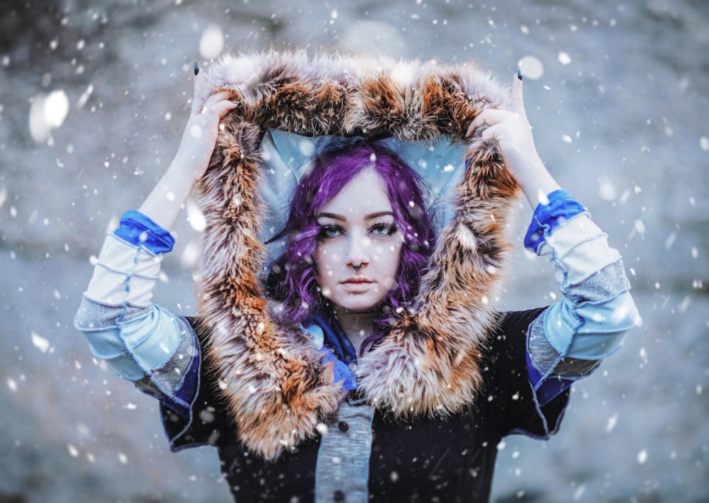 girl in blue and brown fur coat