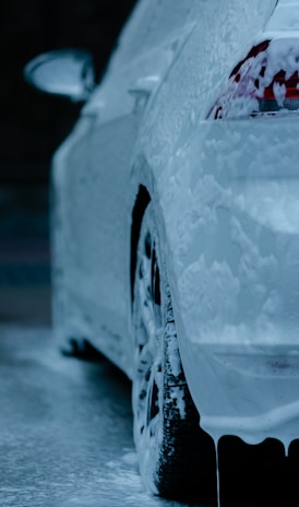 white car with water droplets