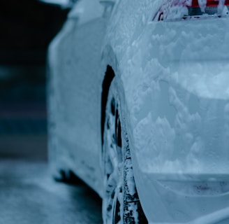 white car with water droplets