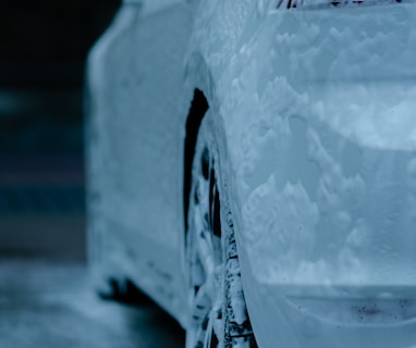 white car with water droplets