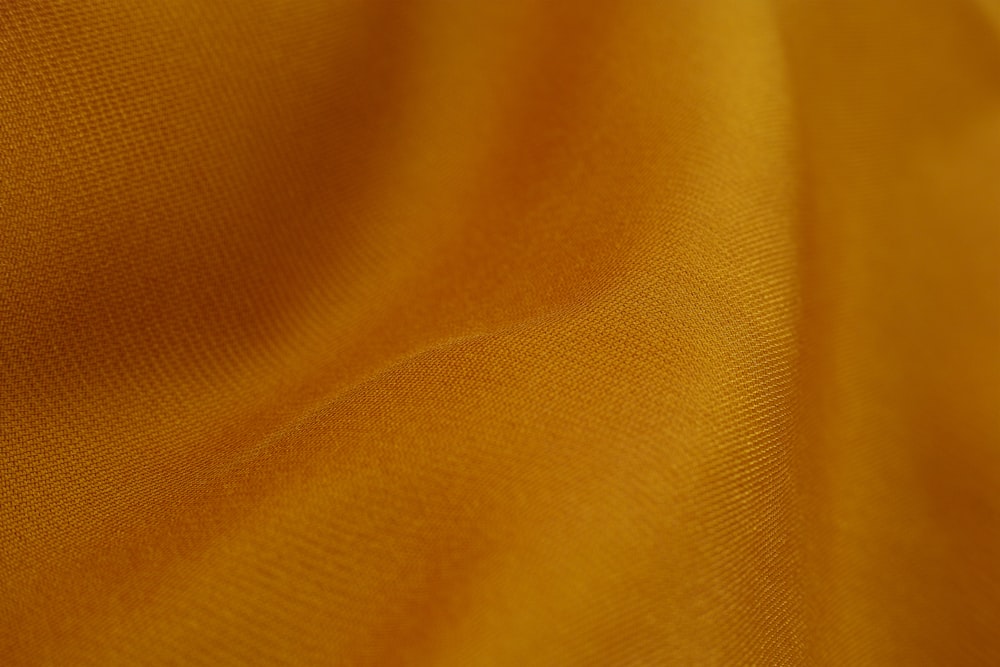 brown textile in close up photography