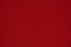 red textile in close up photography