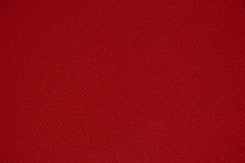 red textile in close up photography