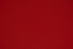 red textile in close up photography